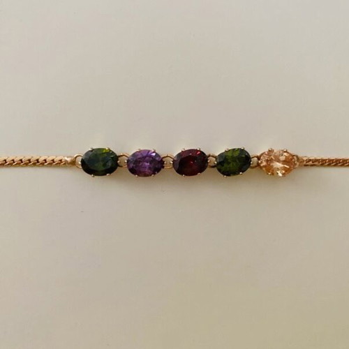 Bracelet used, gold color with multicolored stones