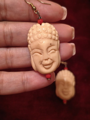 Vintage Laughing Buddha earrings, cream with red beads