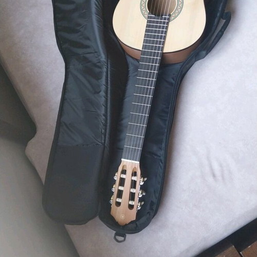 Yamaha classical guitar new with case