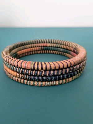 Set of 4 wooden bracelets with colorful weaving like new