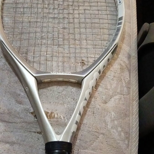 Rackets and cases used, various models including vintage Santos and Wilson