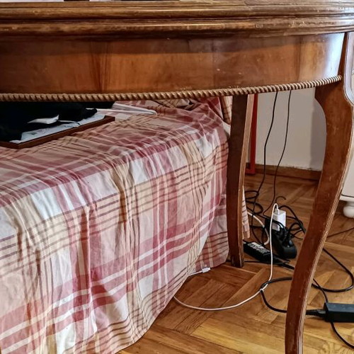 Antique folding table used that converts to round