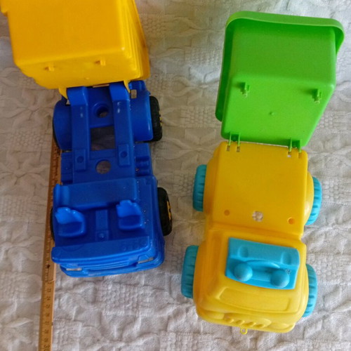 Plastic toy dump trucks used for children