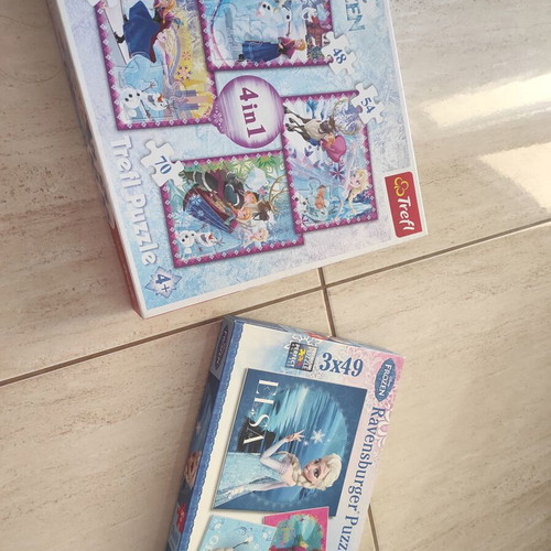 Frozen puzzle set like new with Ravensburger and Trefl