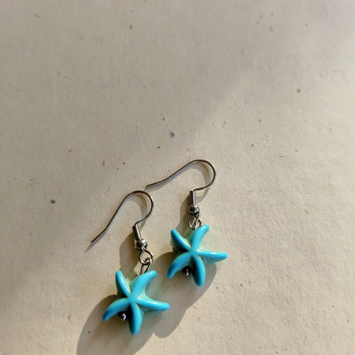 Handmade earrings with blue starfish