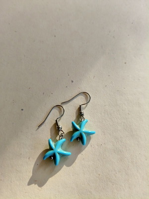Handmade earrings with blue starfish