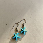 Handmade earrings with blue starfish