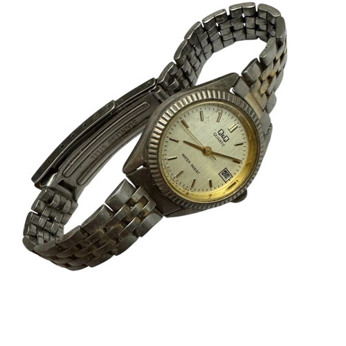 Q&Q Quartz wristwatch women's used, gold and silver