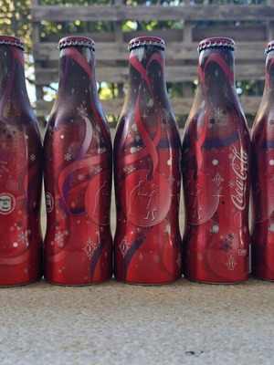 Coca Cola bottles new, festive set of 9 aluminum 250ml