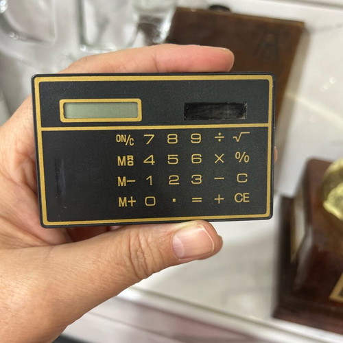 Ultra Thin Calculator with Touchscreen and Solar Power, Like New