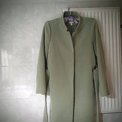 Women's coat H&M like new, pistachio color with belt