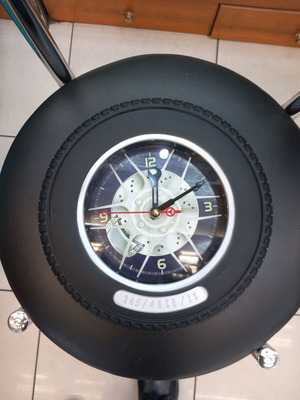 Wall clock shaped like a car wheel new, analog