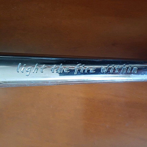 Olympic torch 2002 used with broken glass