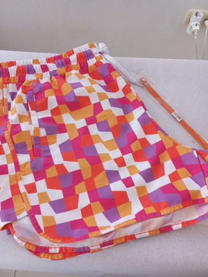 Colorful Shorts Swimwear with Geometric Pattern and Love Bracelet like new