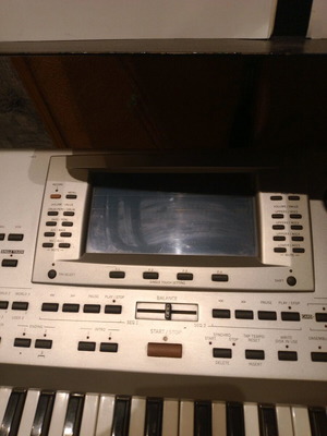 Kord PA 80 keyboard used with Ultimate Support case and Proel stand