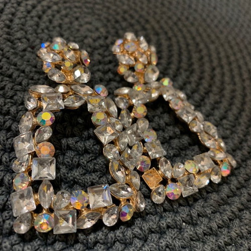 Earrings slightly used, missing one small gem