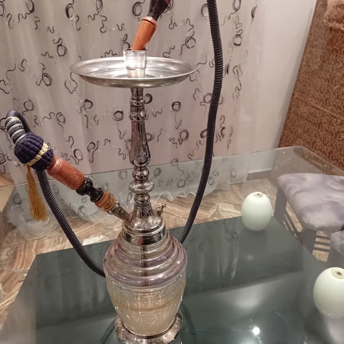 Hookah used with traditional Egyptian metal design and glass base