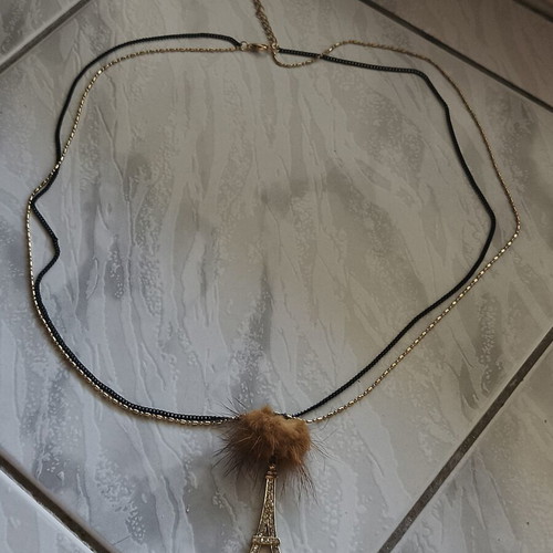Necklace with Eiffel Tower and decorative fur pompom like new, black and gold