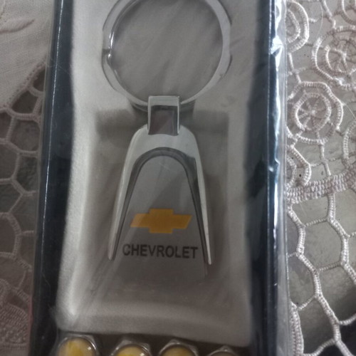 Car keychain set with solar light and valve caps, Chevrolet included