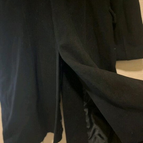 Black coat like new with fur collar and back slit