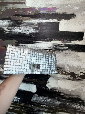 Clutch used silver evening bag with metallic design