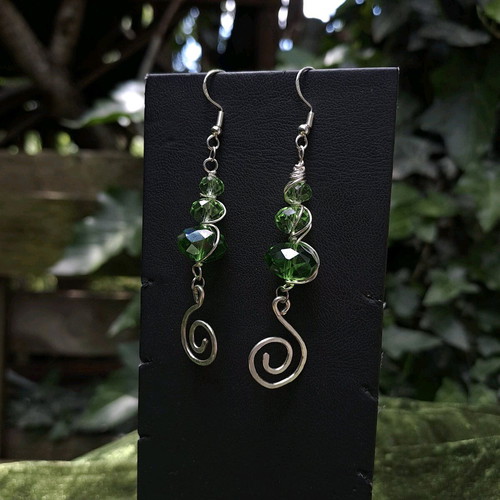 Earrings with green crystals and spiral charms new, silver