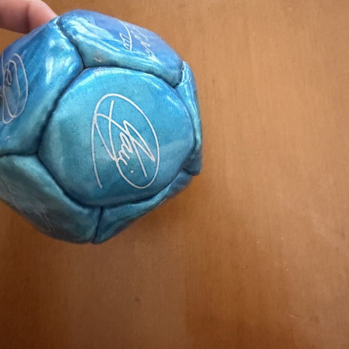 Decorative Barcelona ball with Messi, Xavi, Iniesta signatures