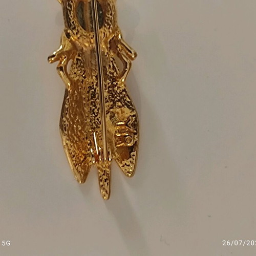 Yves Rocher gold plated brooch like new, cicada design with cabochon stone