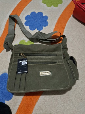 Bag new in olive color with many pockets