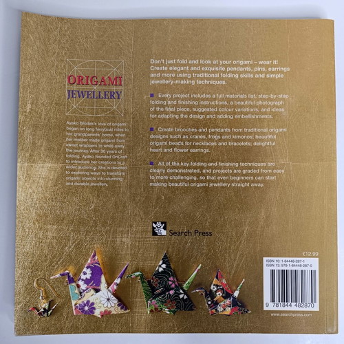 Origami Jewelry book like new, more than 40 designs to fold and wear