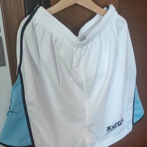 Zeus sportswear medium like new, white and turquoise