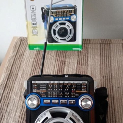 Radio receiver with powerful flashlight new, blue