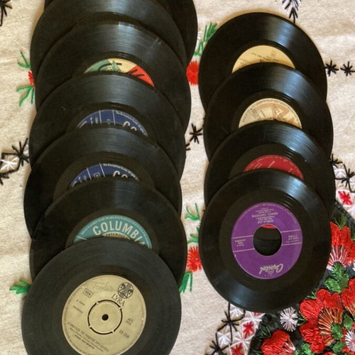 Vinyl 45 rpm records used, pack of 12 with Greek and foreign songs