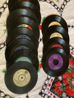 Vinyl 45 rpm records used, pack of 12 with Greek and foreign songs