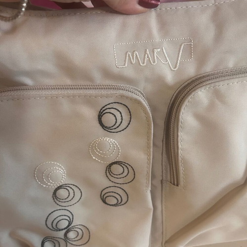 Marv Diaper Bag like new, beige with embroidered circles