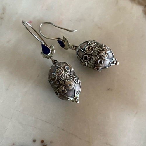 Handmade silver earrings used