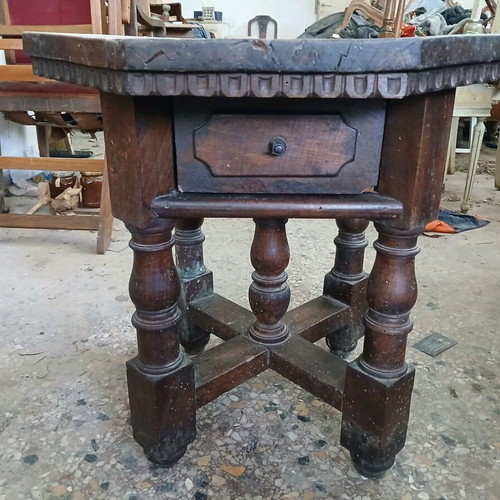 Vintage wooden table used, Victorian era with octagonal surface