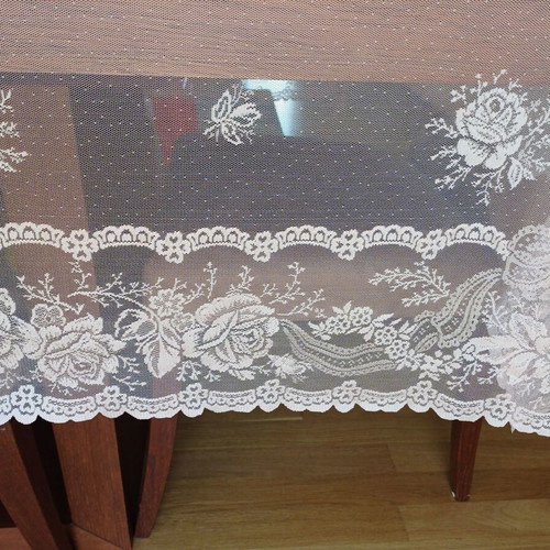 Transparent tablecloth used, light pink with rose patterns
