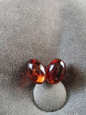 Clip earrings used, made of amber