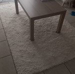Coffee table with shelf
