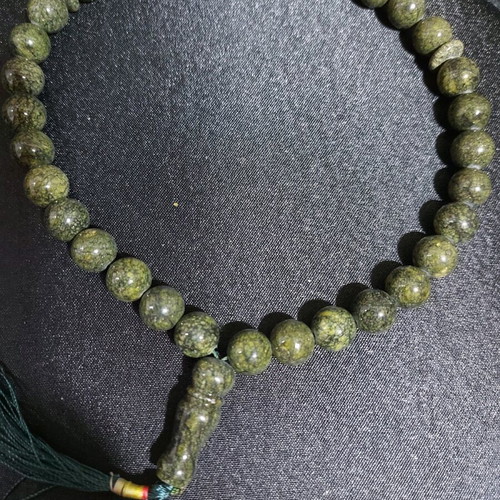 Decorative worry beads from semi-precious spiral stone