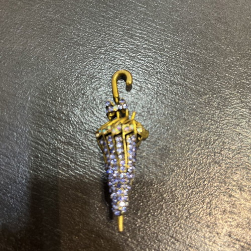 Umbrella-shaped brooch with purple crystals and antique gold metal like new