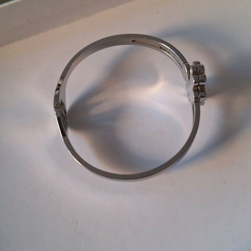 Silver bracelet like new with silver four-leaf clover