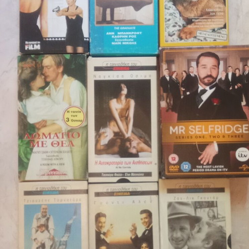 Used videocassettes and DVDs with various titles