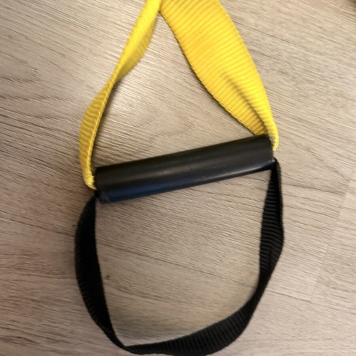 TRX straps used, yellow color, without hook