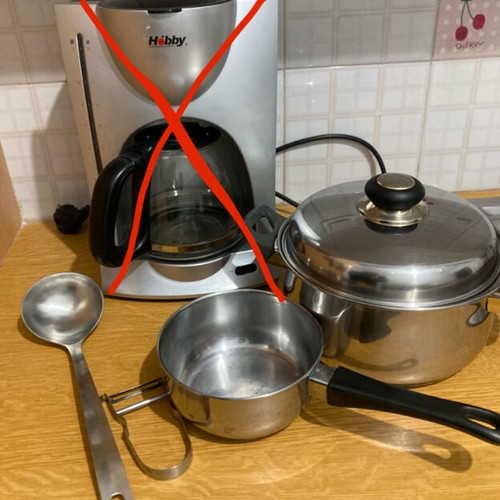Kitchen set used with 2 stainless steel pots and utensils