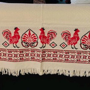 Table linens new, two large embroidered and one rectangular cloth