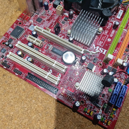 MSI G31M3-F motherboard used with Intel processor and heatsink