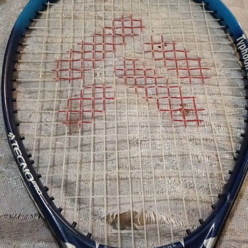 Rackets and cases used, various models including vintage Santos and Wilson