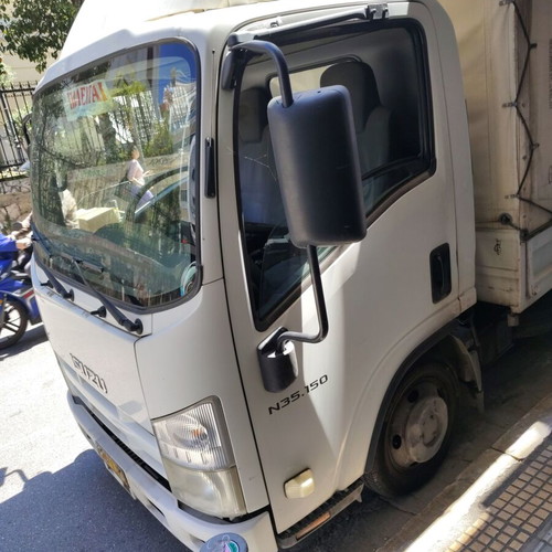 Isuzu truck 2012 used with open cargo bed, ready for work